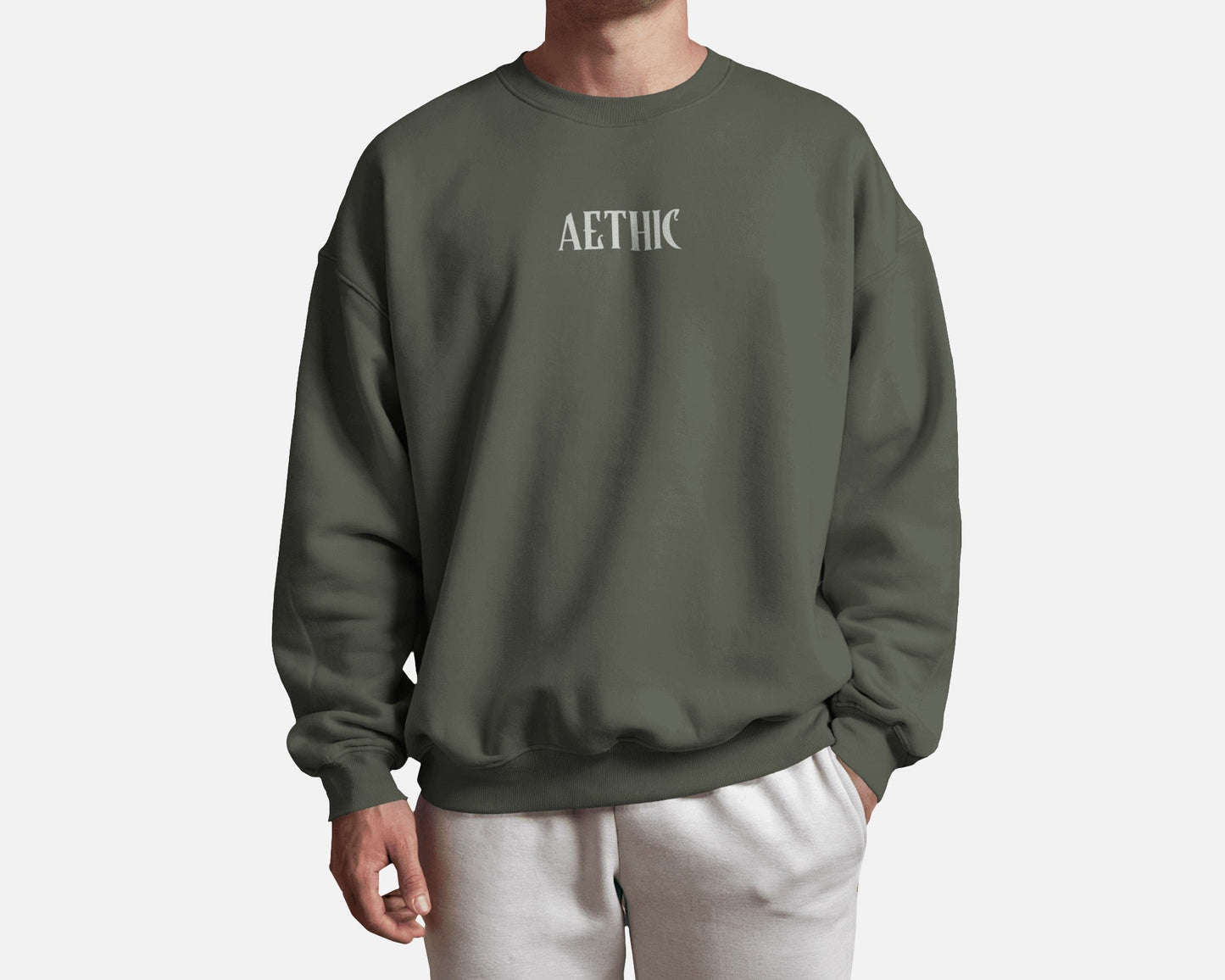 Winter Soldier graphic print sweatshirt in dark green by Aethic Apparels, made with premium cotton fleece and unisex relaxed fit.