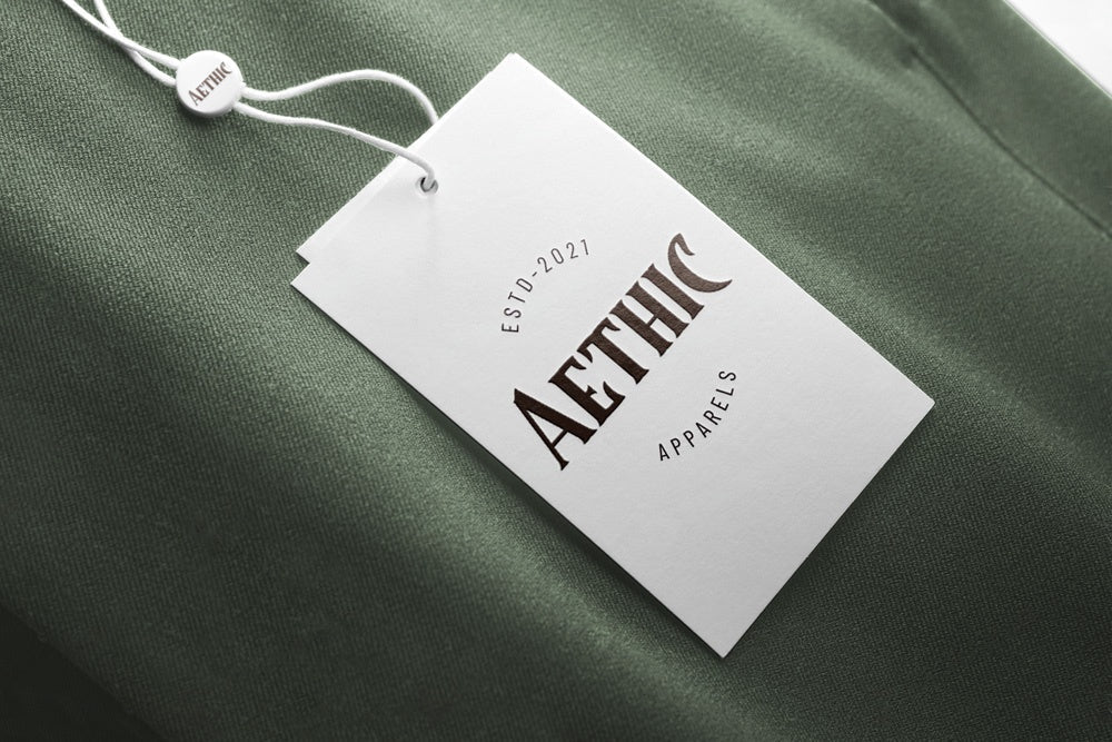 Green fabric with a 'Aethic Apparels' tag on a white background