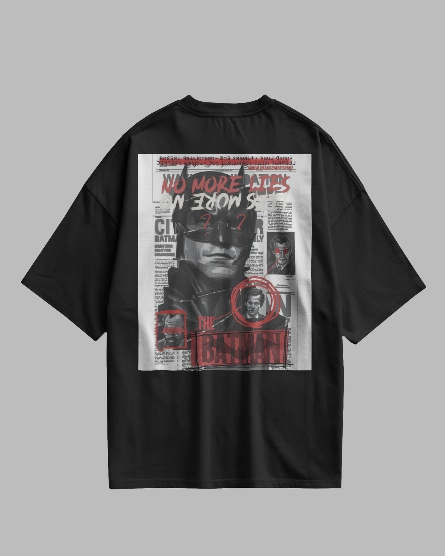 Black t-shirt with graphic design on a gray background