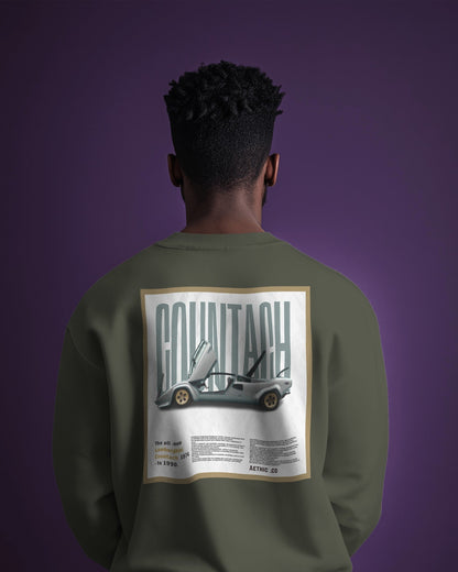 Back view of green sweatshirt featuring Lamborghini Countach vintage car print