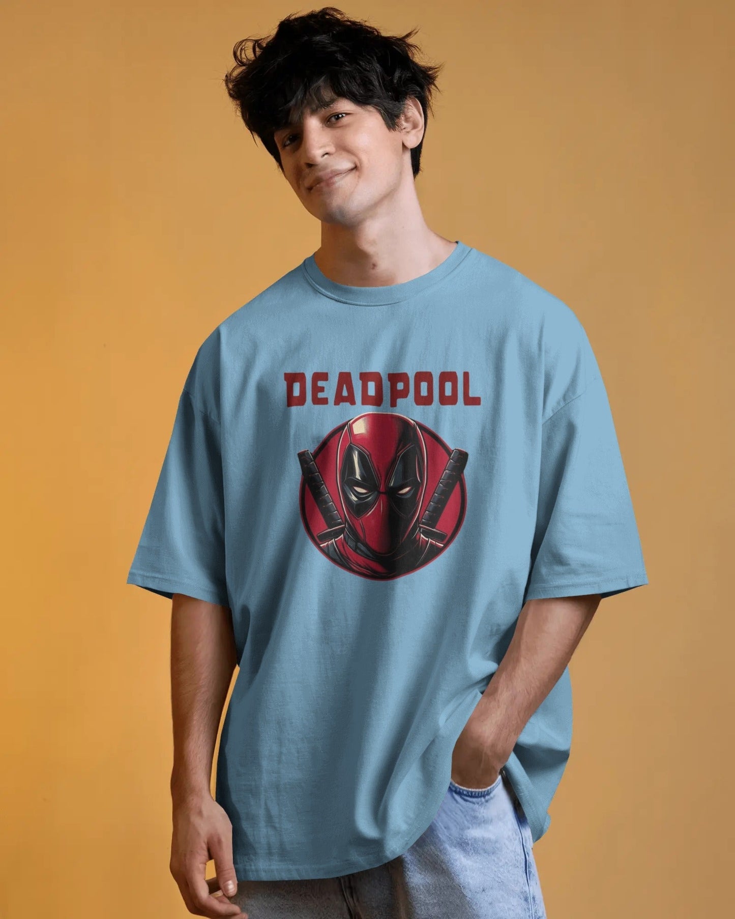 Person wearing a baby blue t-shirt with a Deadpool
