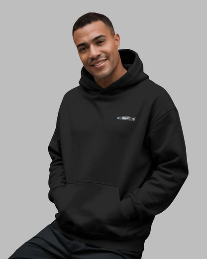 male model wearing black Ford GT hoodie – side view with graphic print – Aethic Apparels