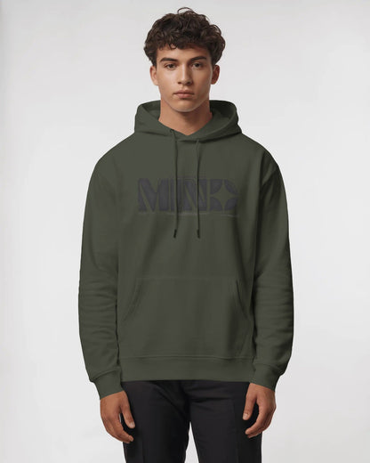 Person wearing a green hoodie with a brand logo on a white background
