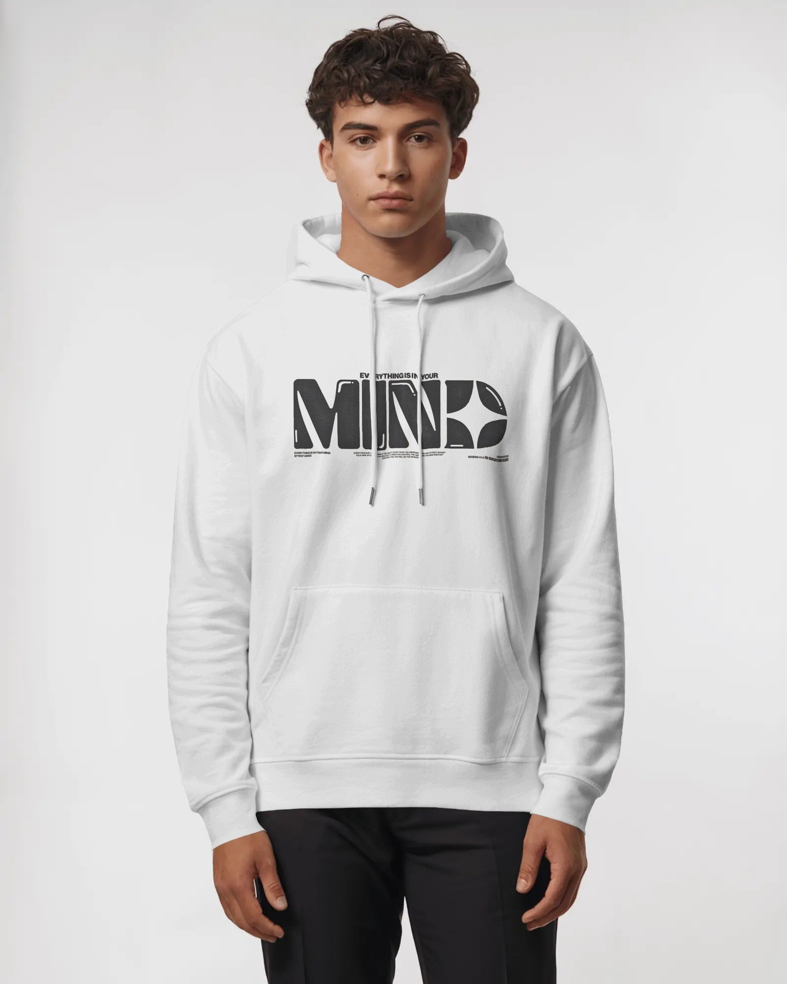 Person wearing a white hoodie with a logo on a plain background