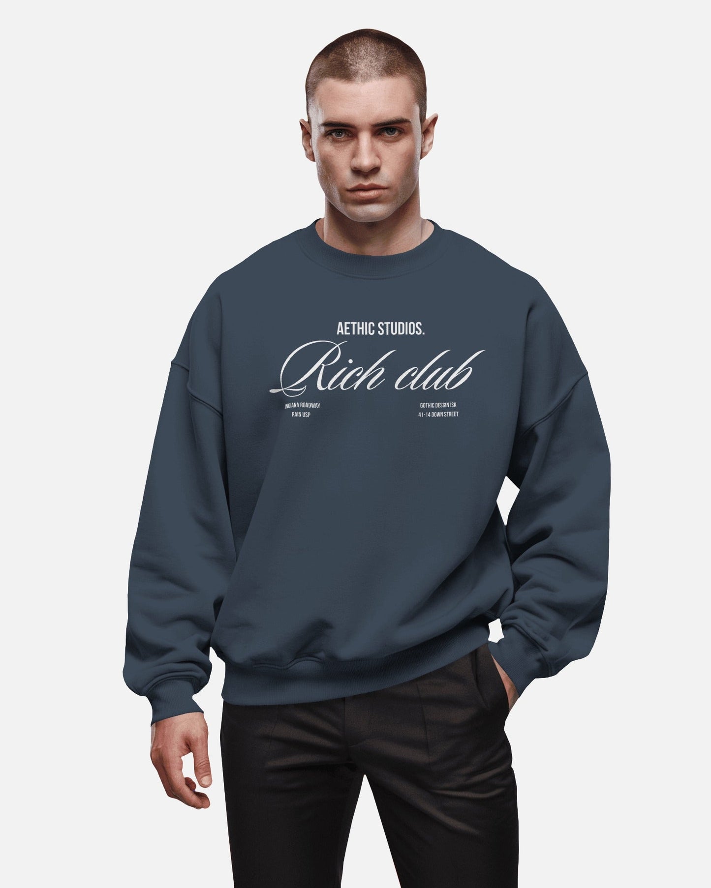 Front view of oversized sweatshirt with Rich Club text design and relaxed fit