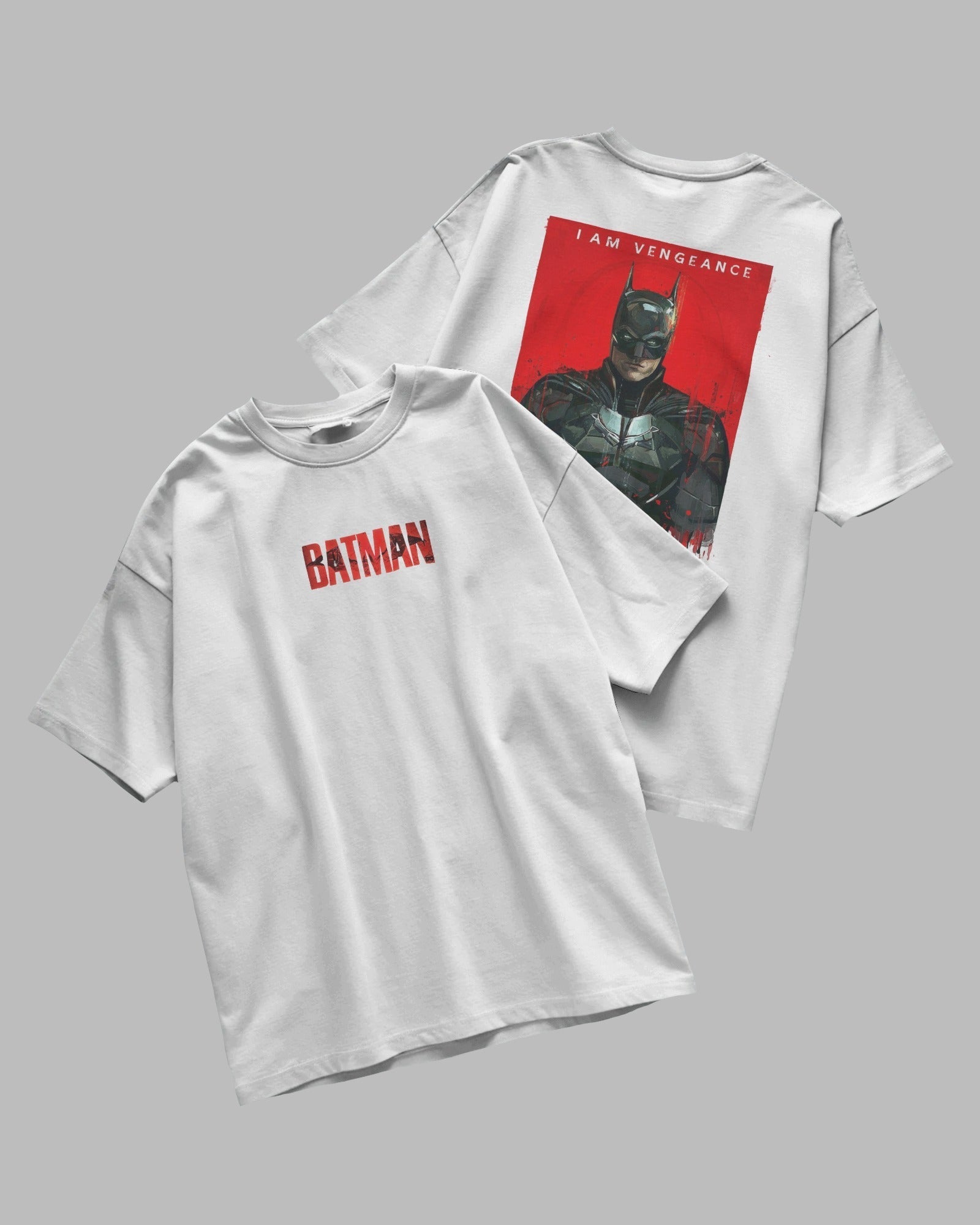 White t-shirt with Batman graphic design on a gray background