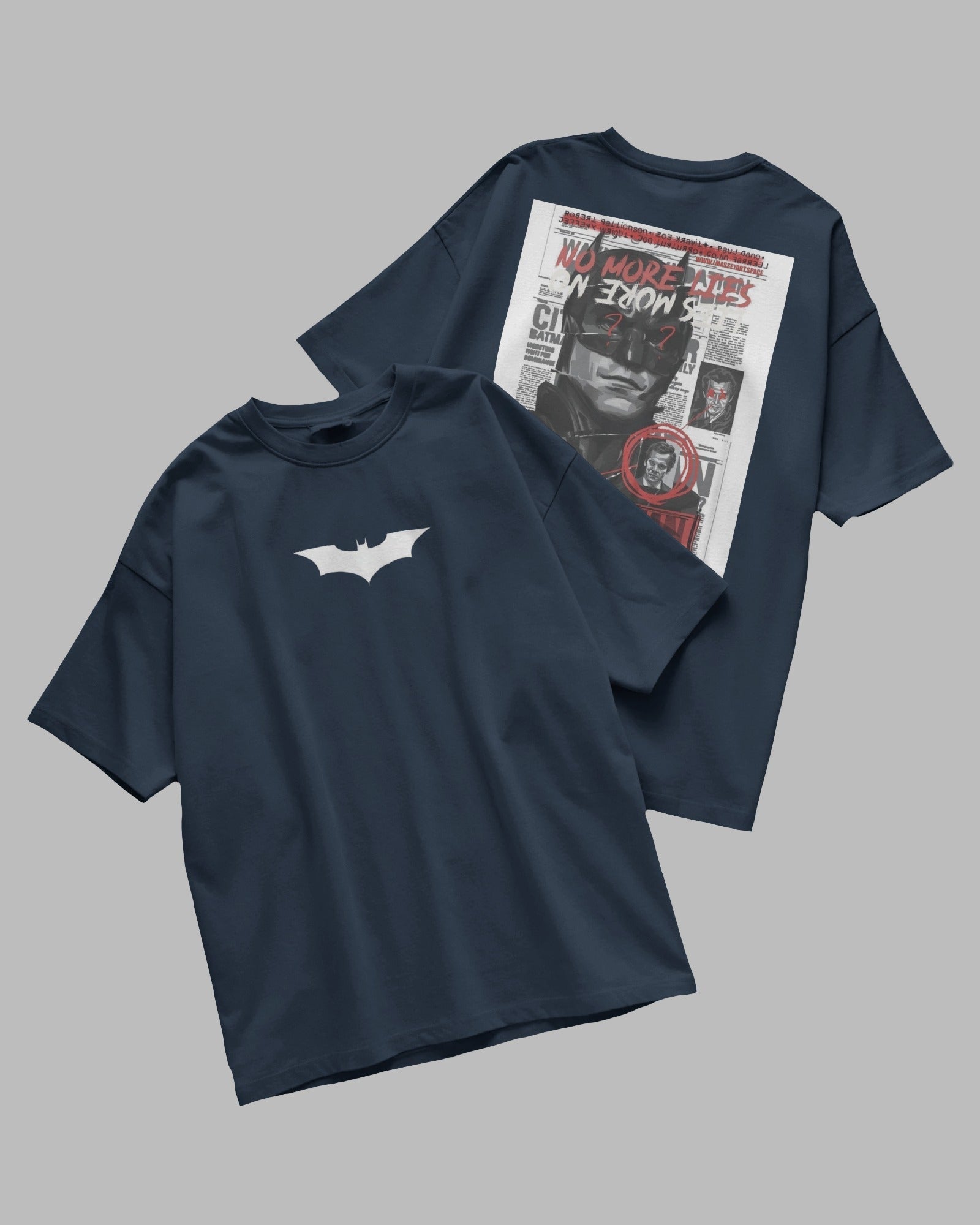 Navy blue t-shirt with a white bat logo on the front and a graphic design on the back, displayed on a gray background.
