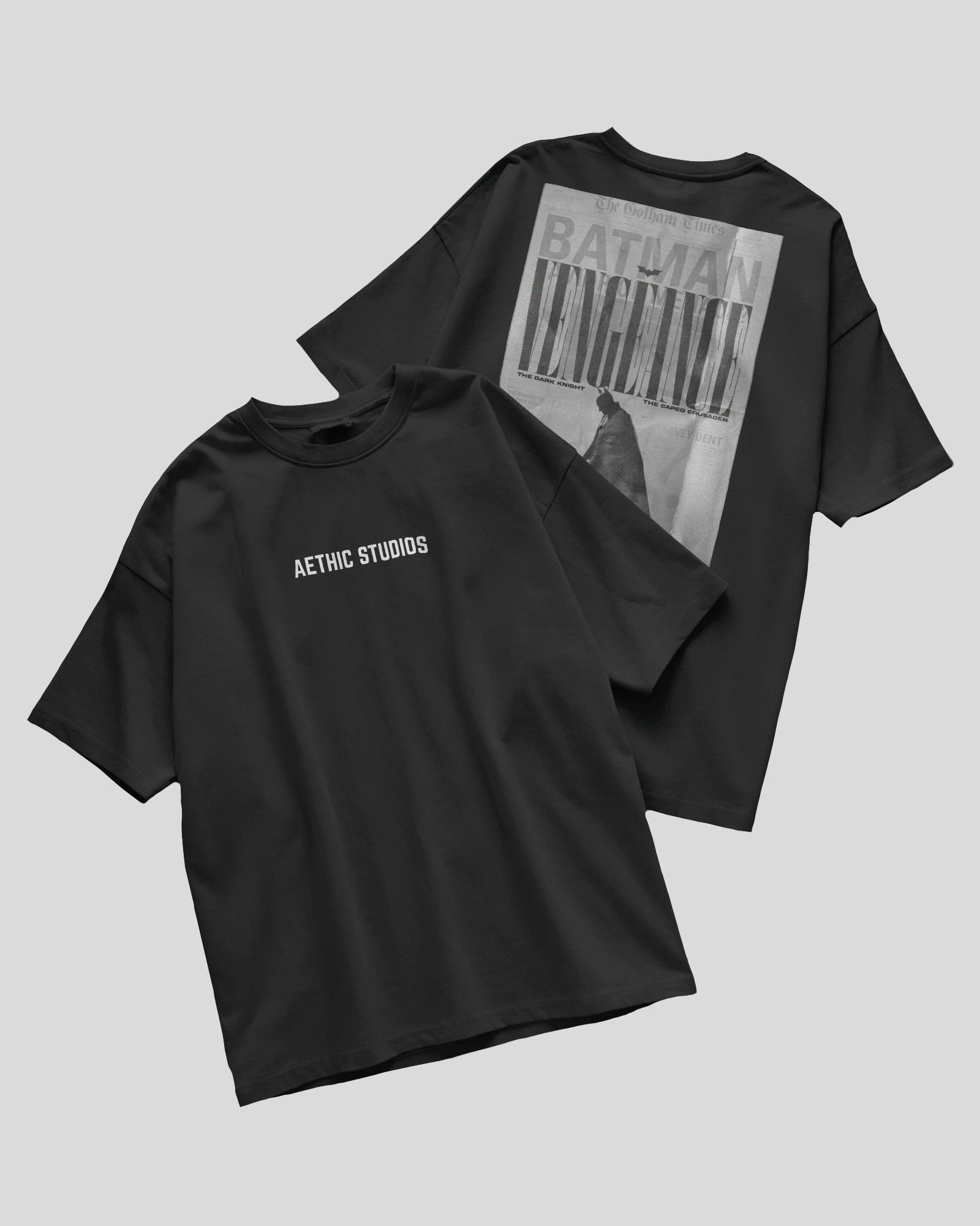 Black t-shirt with 'Aethic Studios' logo on front and graphic design on back, on a light gray background