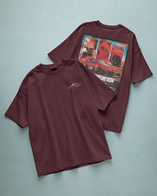 Colour_Maroon t-shirt with a graphic design on the front and back on a light blue background