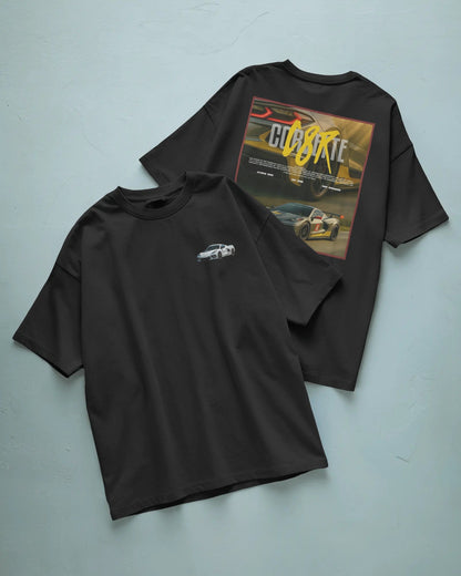 Colour_Black t-shirt with car design on front and back on a light blue background