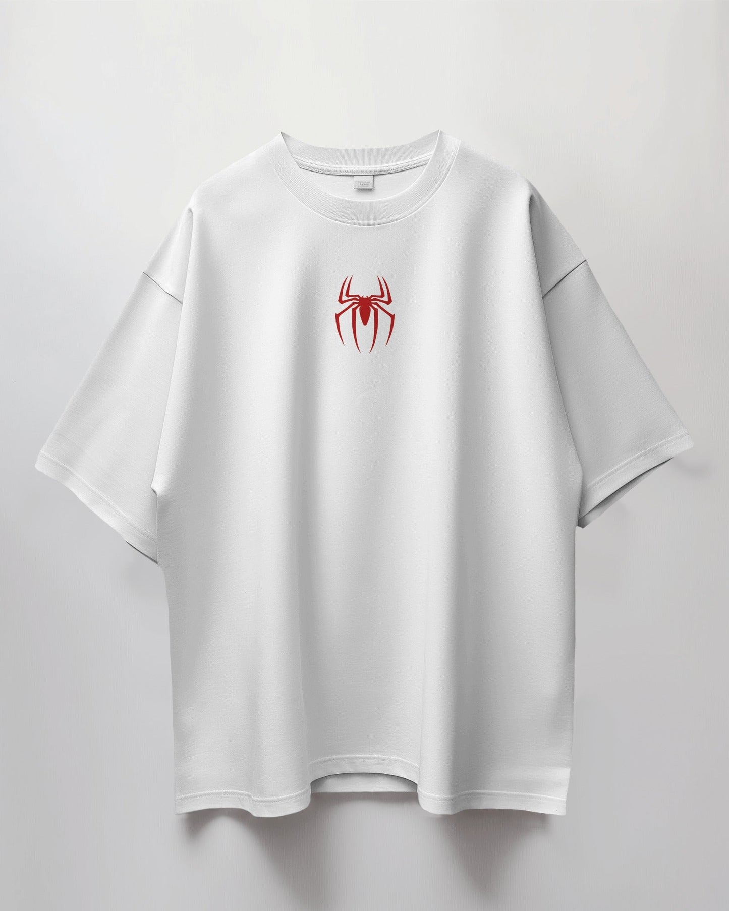 Colour_White t-shirt with a red spider logo on a light gray background
