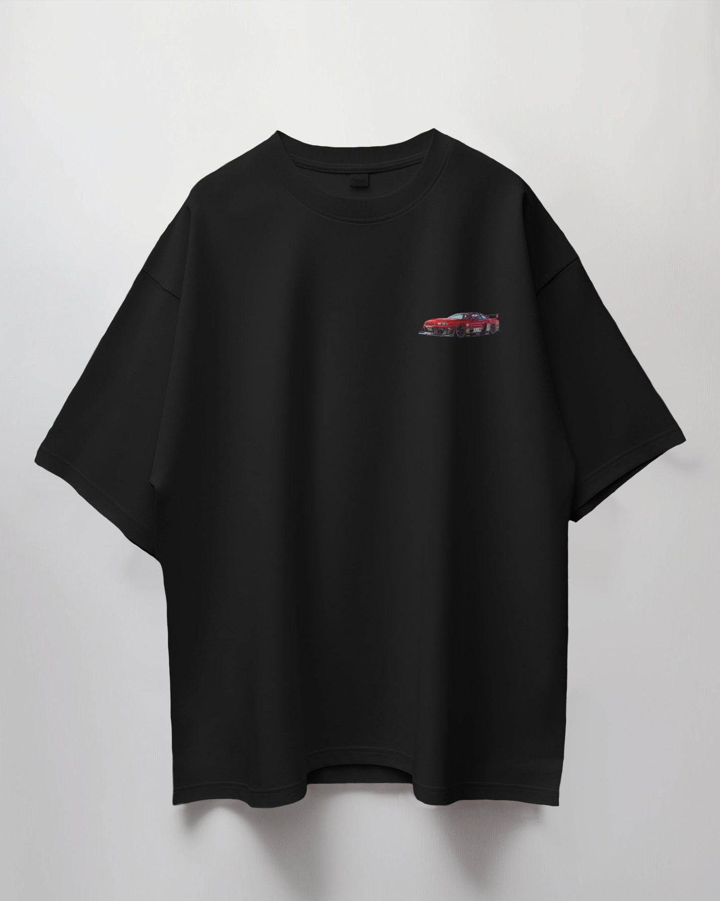 Colour_Black t-shirt with a small red graphic on a light gray background
