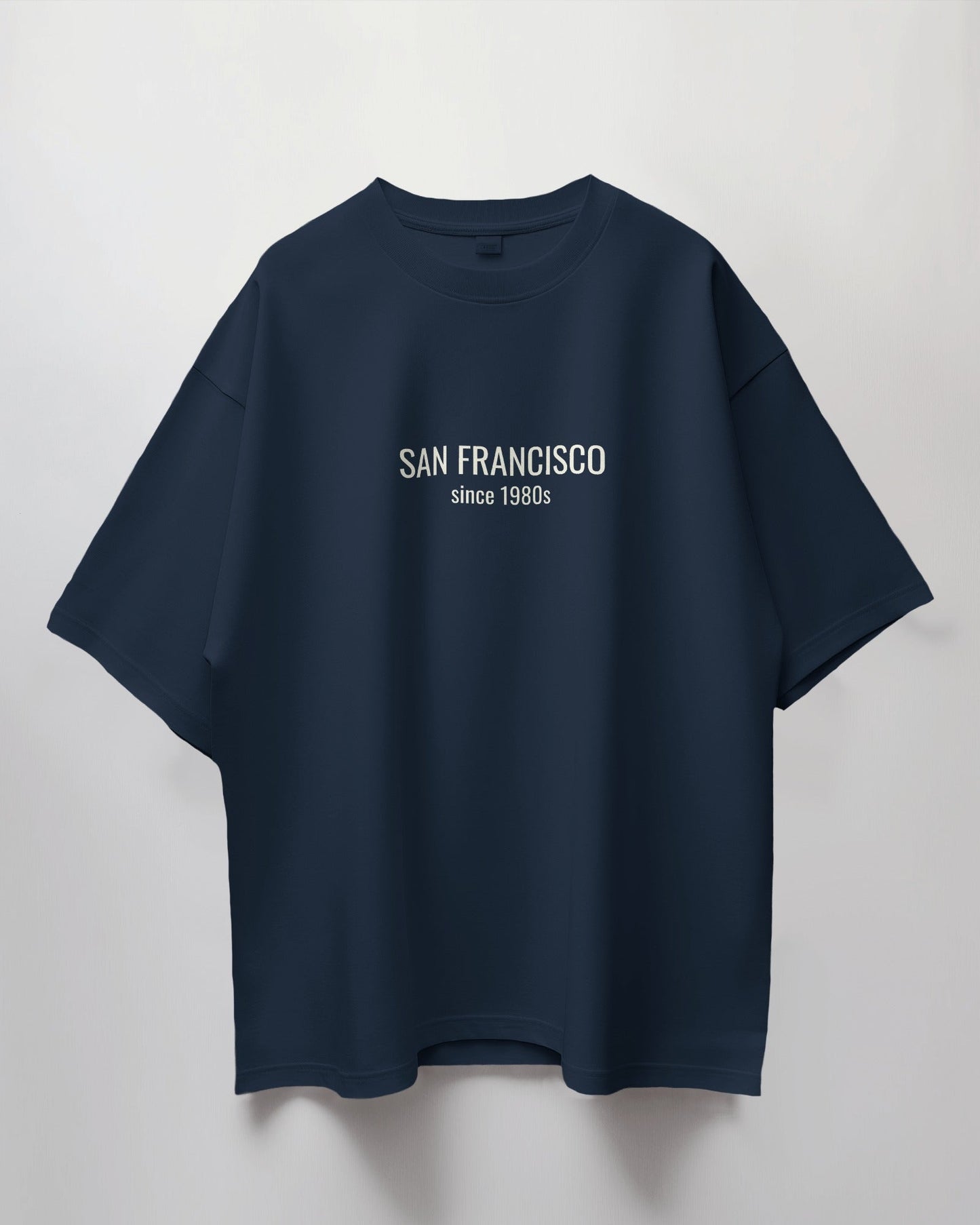 Navy blue t-shirt with 'San Francisco since 1980s' text on a light gray background