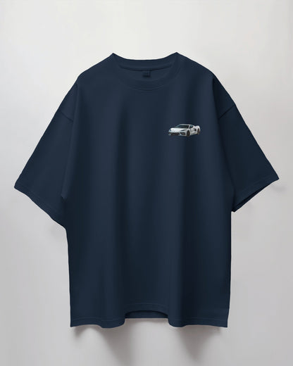Colour_Navyblue t-shirt with a small white car graphic on a light gray background