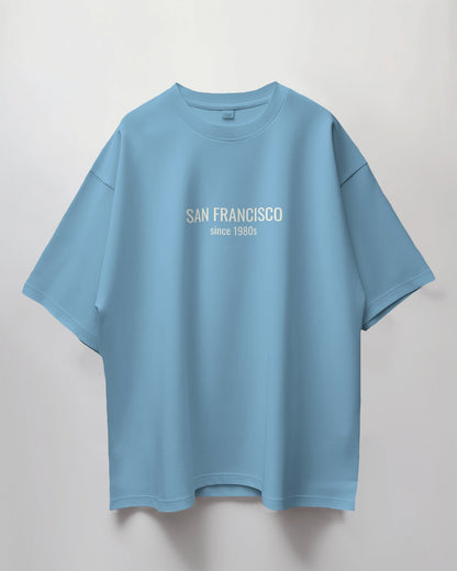 Light blue t-shirt with 'San Francisco since 1980s' text on a light gray background
