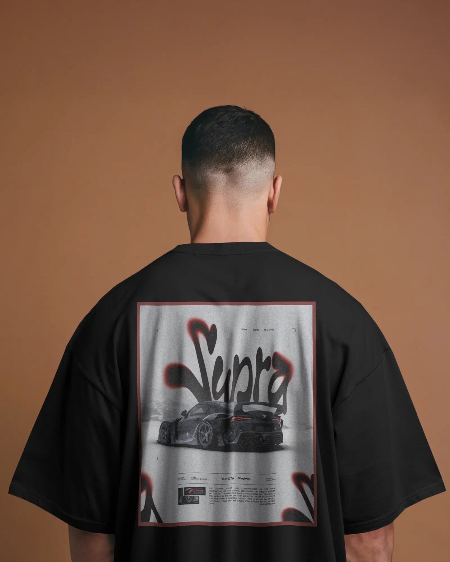 Person wearing a Colour_black t-shirt with 'Supra' graphic on the back against a brown background