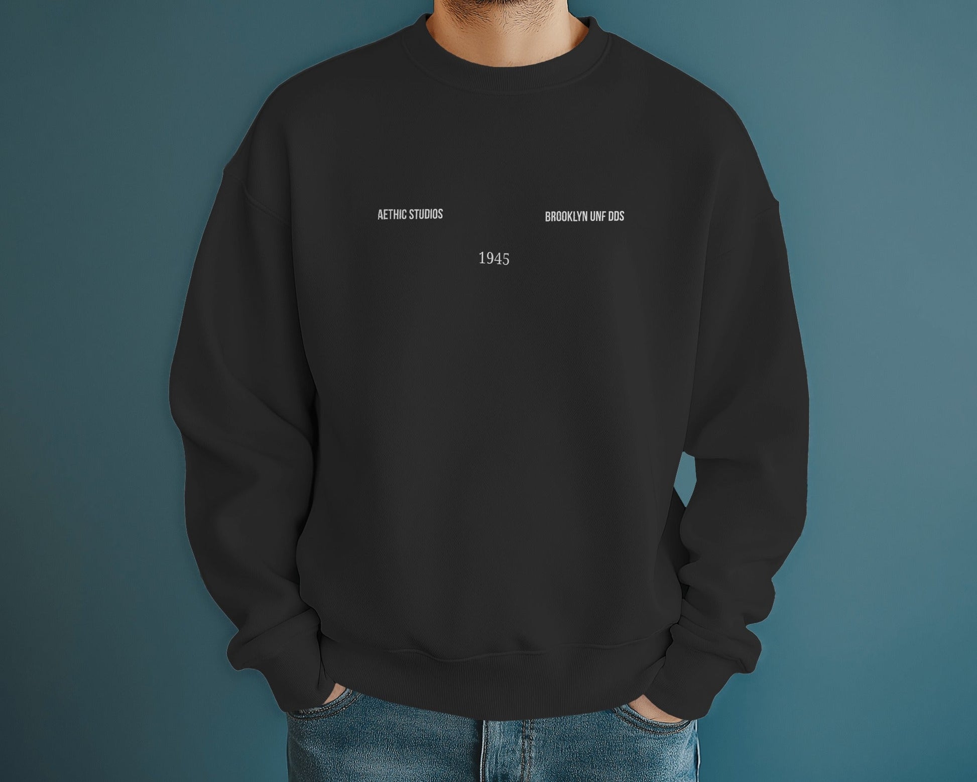 Black sweatshirt with white text on a blue background