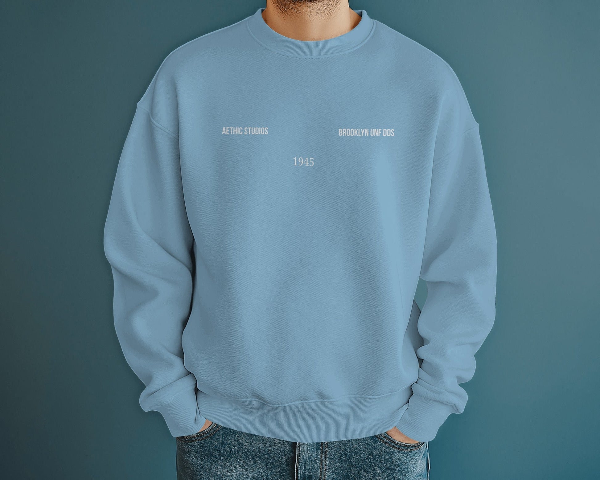 baby blue sweatshirt with text on a solid background