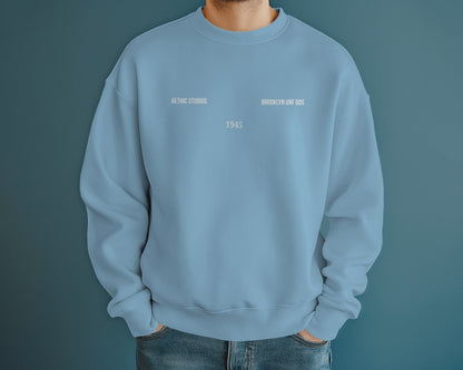 baby blue sweatshirt with text on a solid background